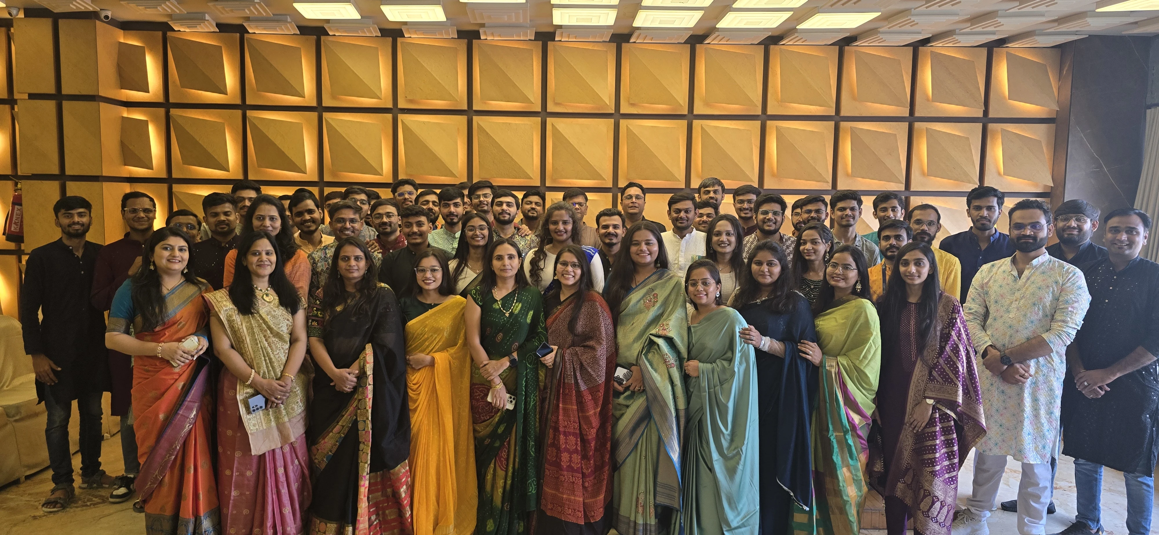 Life at PlusInfosys - Team celebrating and working together